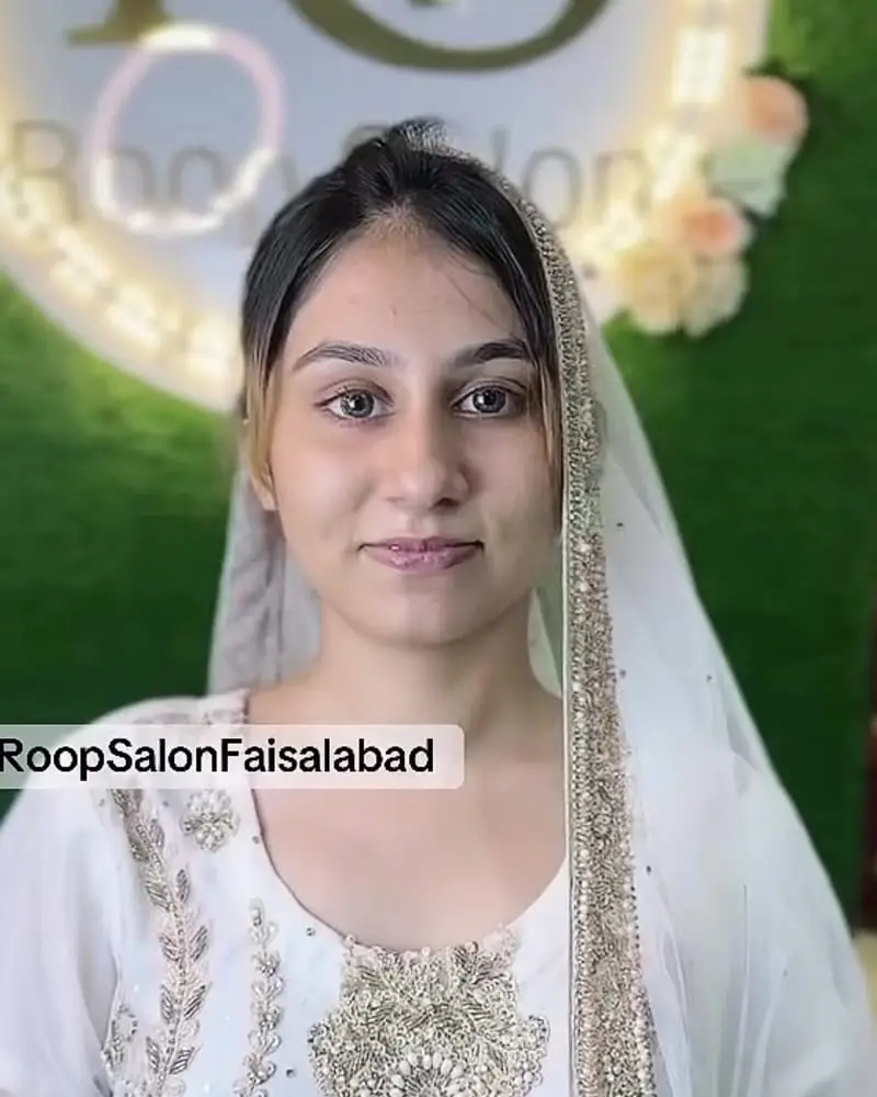 Before: the bride with no makeup, wearing a white dupatta