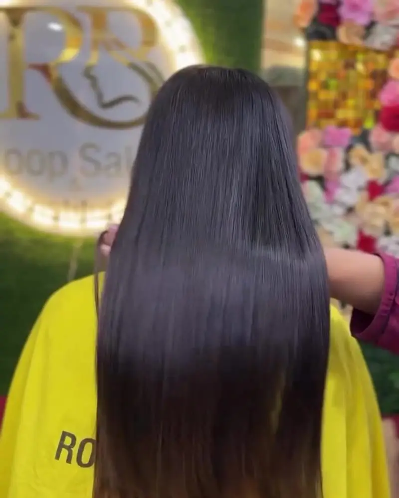 After: the same hair smooth, straight and glossy